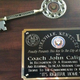 Illustration for article titled John Calipari Received The Key To The City, And The Plaque Has Typos In The Words The And Its